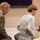 Dylann Roof (right) is helped to his chair by chief public defender Ashley Pennington during a hearing at the Judicial Center July 16, 2015, in Charleston, S.C. Roof is charged with murdering nine worshippers at a historic black church in Charleston.
Randall Hill - Pool/Getty Images